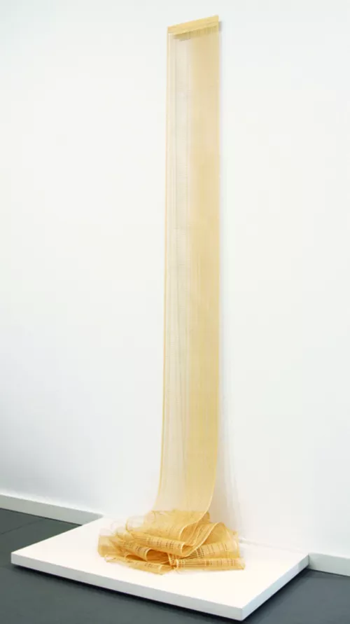 Untitled (Vertical Installation, Yellow) Hand-Cut Ledger Paper (Dimensions Variable - approx: 81.5”x 28”x 18”) 2010