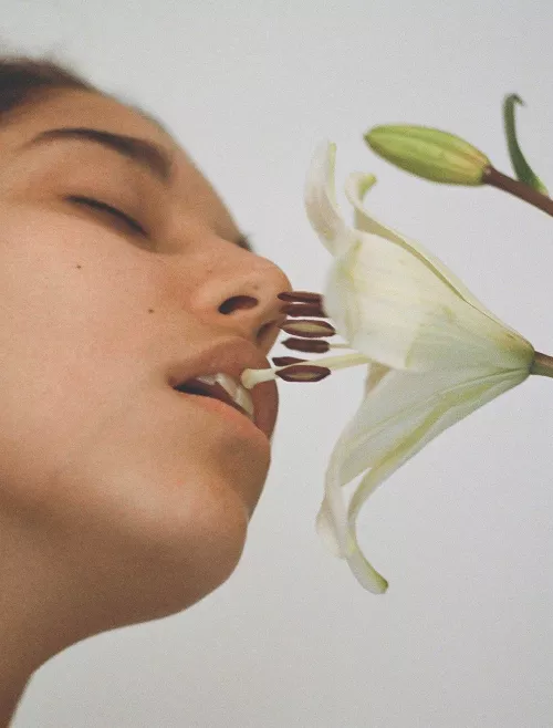 Alejandra and a lily, 2017. Photo: Carlota Guerrero.